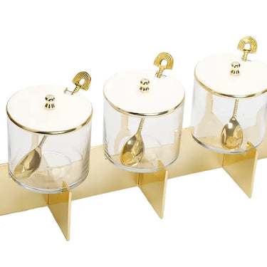 Glass Jars Set on Gold Stand